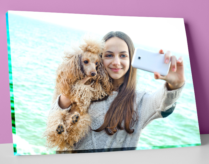 Girl taking selfie with her pet printed on canvas